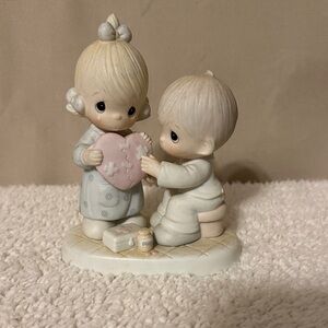 Precious Moments Figurine with Pink Heart and Blue Outfit
